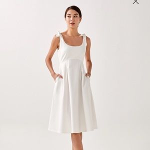 Stretch midi dress with shoulder bows with pockets